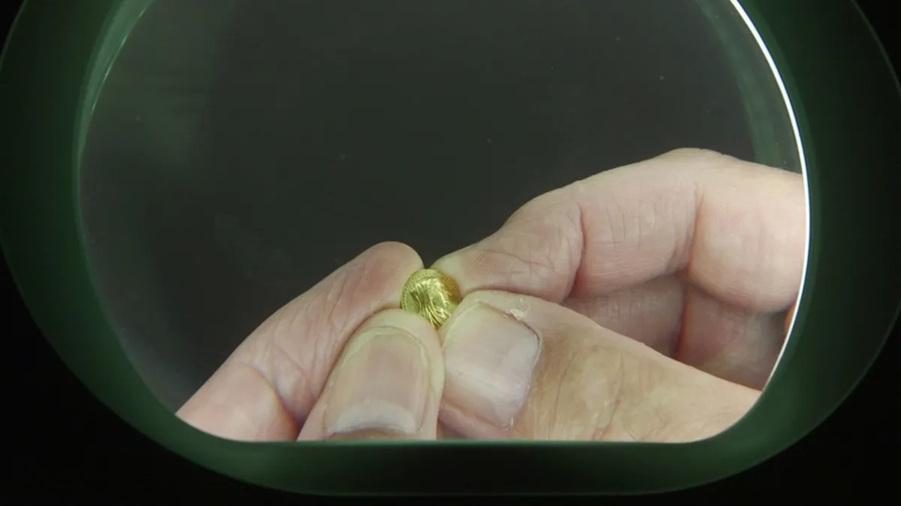 regina egitto moneta